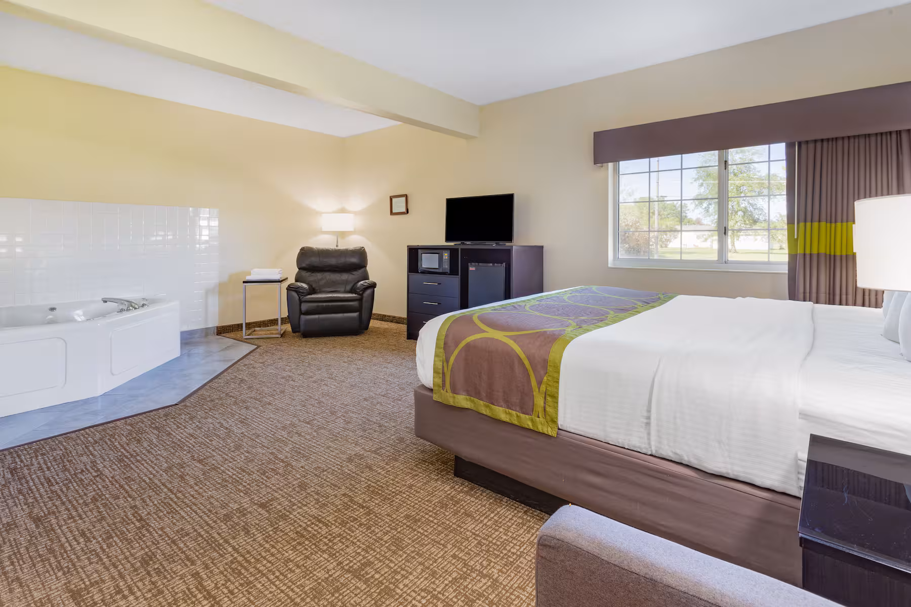 Single King Suite with king bed and jacuzzi